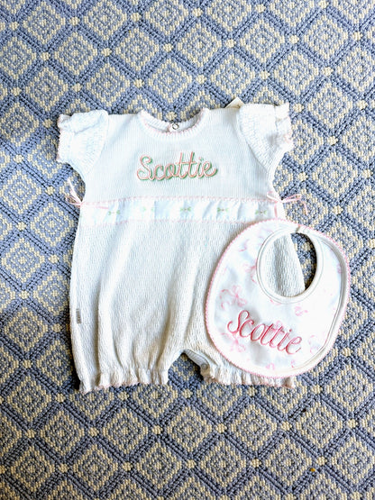 John Oliver Designs - White bubble/romper + matching bib, pink embroidery