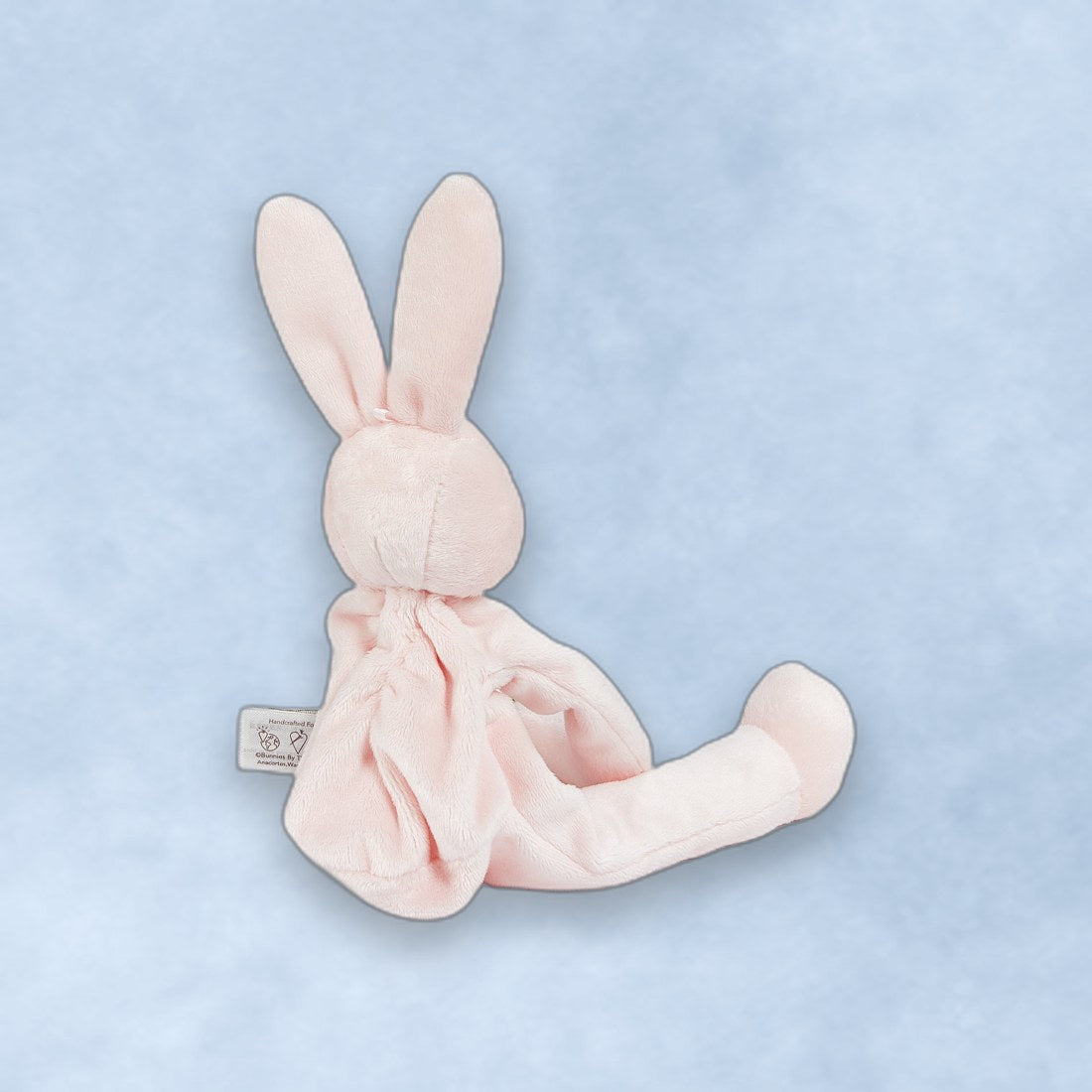 Blossom Bunny back view — where an embroidered name shows through
